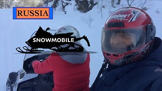 Snowboarding and Snowmobile in Sochi, Russia