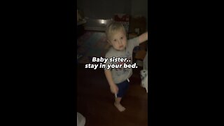 Toddler Helps Put His Baby Sister To Bed