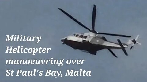 Military helicopter performing manouevers over St. Paul's Bay, Malta, at the Maltese Airshow 2023