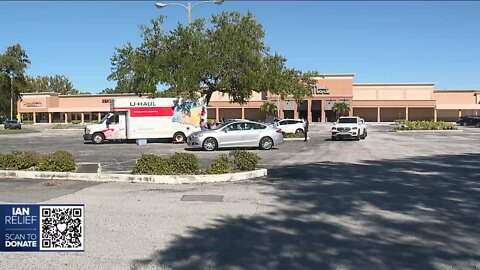 Palm Harbor residents pack a U-haul with supplies for Ft. Myers