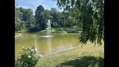 Park, people and pond.