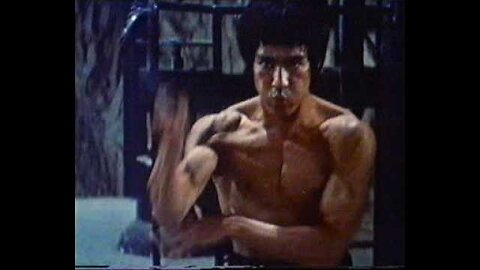 Cross kick Studio Films Bruce Lee with nunchucks Enter the Dragon