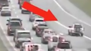 SUV Ducked Traffic By Driving Backwards Out Of It — DANGEROUS!