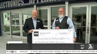 NFM donates thousands of dollars and pounds of food to Food Bank for the Heartland