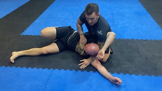 Crucifix position for self-defense