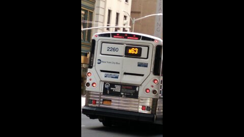 Mta NYC transit express buses at the bus stop 5th Ave and 32nd Ave Manhattan ny