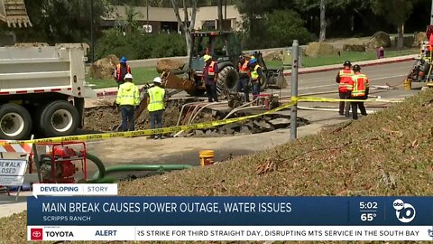 Water main break causes flooding, damages road
