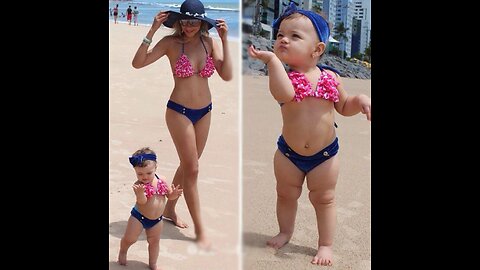 A little fashionista, just a model) imitates her mother!