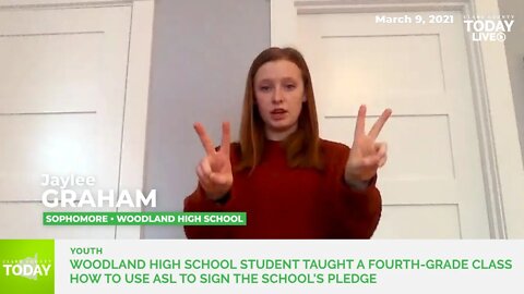 Woodland High School student taught a fourth-grade class how to use American Sign Language to sign t