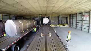 Picking up Paper Rolls being loaded on a truck