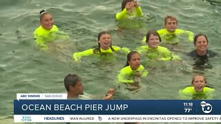Junior Lifeguards jump off Ocean Beach Pier