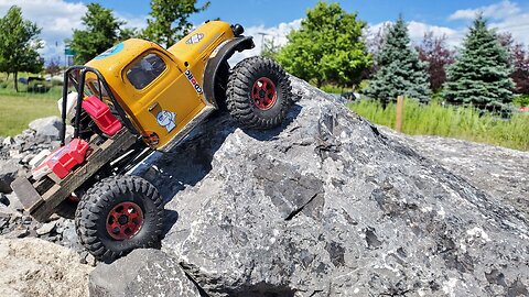 FCX24 on the rocks and lakeside crawler park
