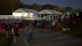 Fans rush to make it to first tee at Ryder Cup