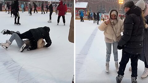 Woman epically slams into man while trying to ice skate