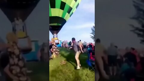 Hot air balloon plows through a crowd of people 😳#shorts #crazyvideo #hotairballoon #watchout