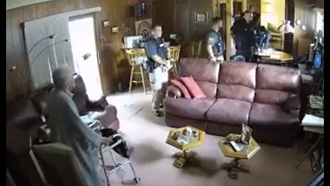 Footage of Police Officers Raiding Local Kansas Newspaper Owner