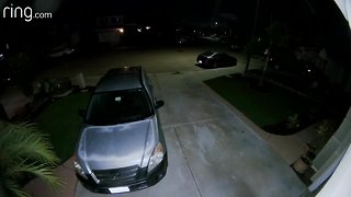 SUV hits garage door