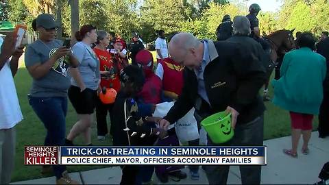 Mayor, Police Chief trick-or-treat in Seminole Heights on Halloween