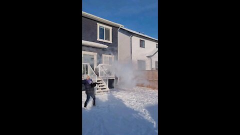 Boiling hot water freezes instantly into white powder