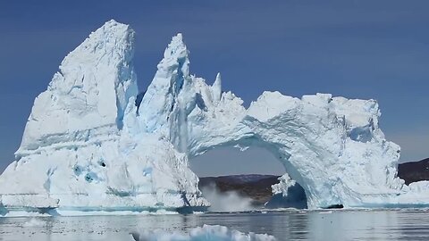 Massive iceberg crashes into sea in Diskobay, Greenland