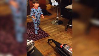 Cute Kid Has Fear Of Vacuum