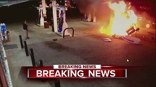 Fiery crash at gas station caught on video