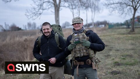 Two ex British soldiers prepare to cross the border to Ukraine from Medyka, Poland