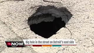 Big hole opens in street in Detroit