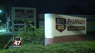 Lansing pharmacy robbed at gunpoint