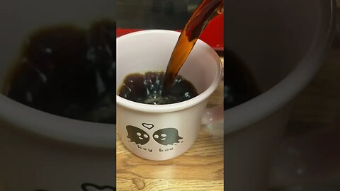 Pouring Coffee Into The “Hey Boo” Pink Halloween Mug