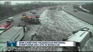 Semi carrying hazardous material overturns on I-275 in Romulus