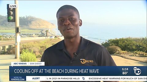 Cooling off at the beach during heatwave