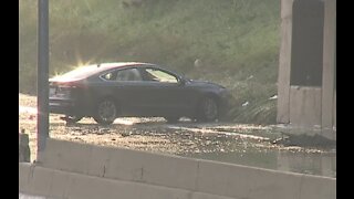 How could flooding & standing water affect long-term road conditions on I-94?