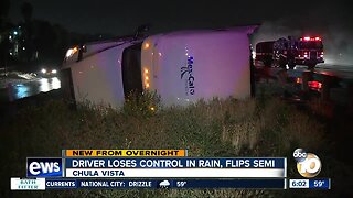 Semi-truck flips off I-805 in Chula Vista