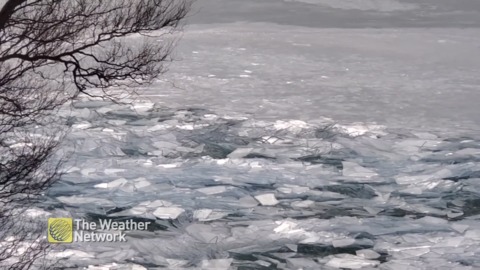 Cracking ice pushes towards shore