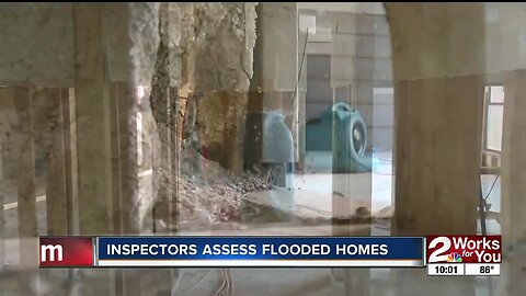 Inspectors assess flood damage to Town and Country homes
