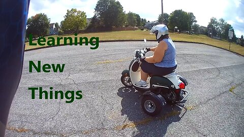 My wife rides her scooter trike for the first time! Baby steps!