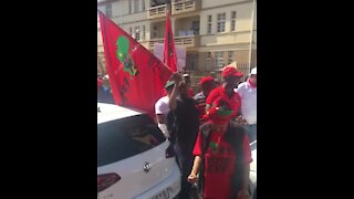 EFF members outside Hillbrow police station