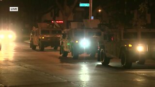 National Guard arrives at Milwaukee Police District 5 Saturday night