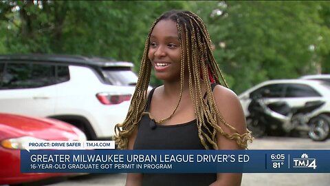 One of the first students from a new drivers education class in Milwaukee gets her permit