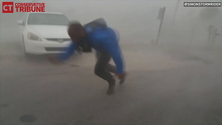 Meteorologist Gathering Data During Hurricane