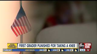 First grader told to stand after taking a knee during Pledge of Allegiance