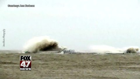 PHOTOS: Massive wave knocks over Lake Michigan lighthouse