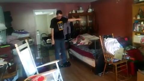 Guy Rides Hoverboard In The Living Room