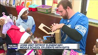 Lions visit Detroit elementary, middle school students with gifts