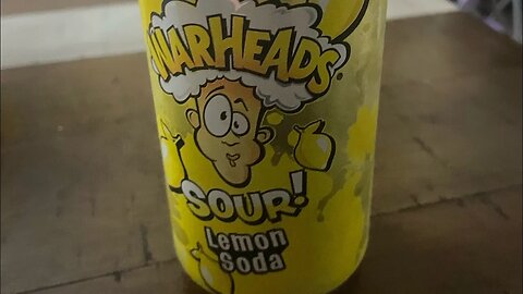 We try sour warhead, lemon soda.