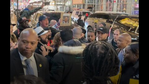 NYC Mayor Eric Adams surrounded by protesters against mandates at Times Square restaurant - 4/6/2022