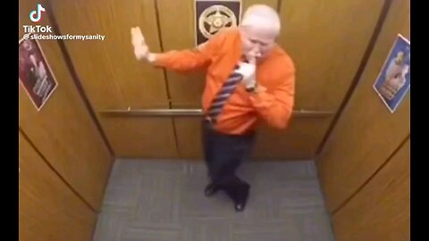 Guy dancing with cops in a elevator