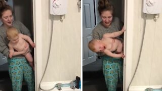 Baby loves bath time more than anything else in the world