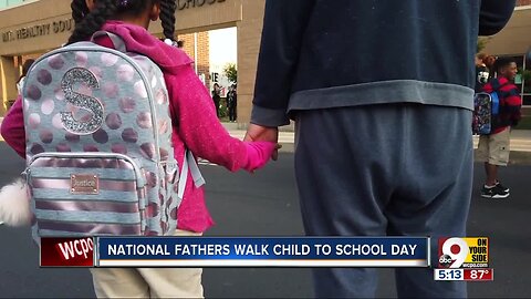 Elementary school highlights the importance of dads with a morning walk to school